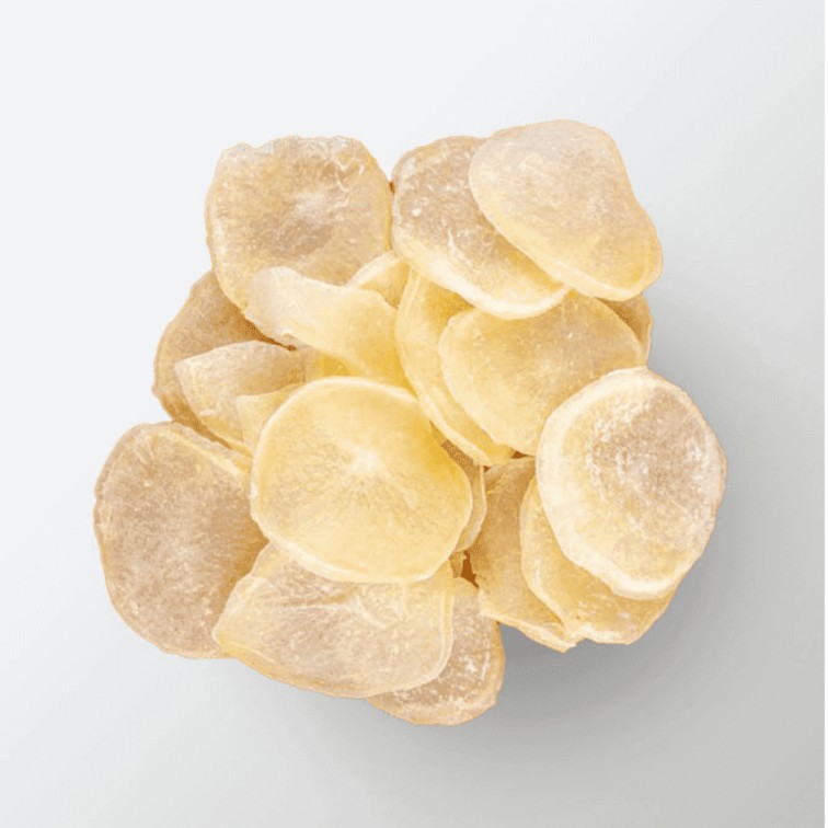 Potato slices on a white surface